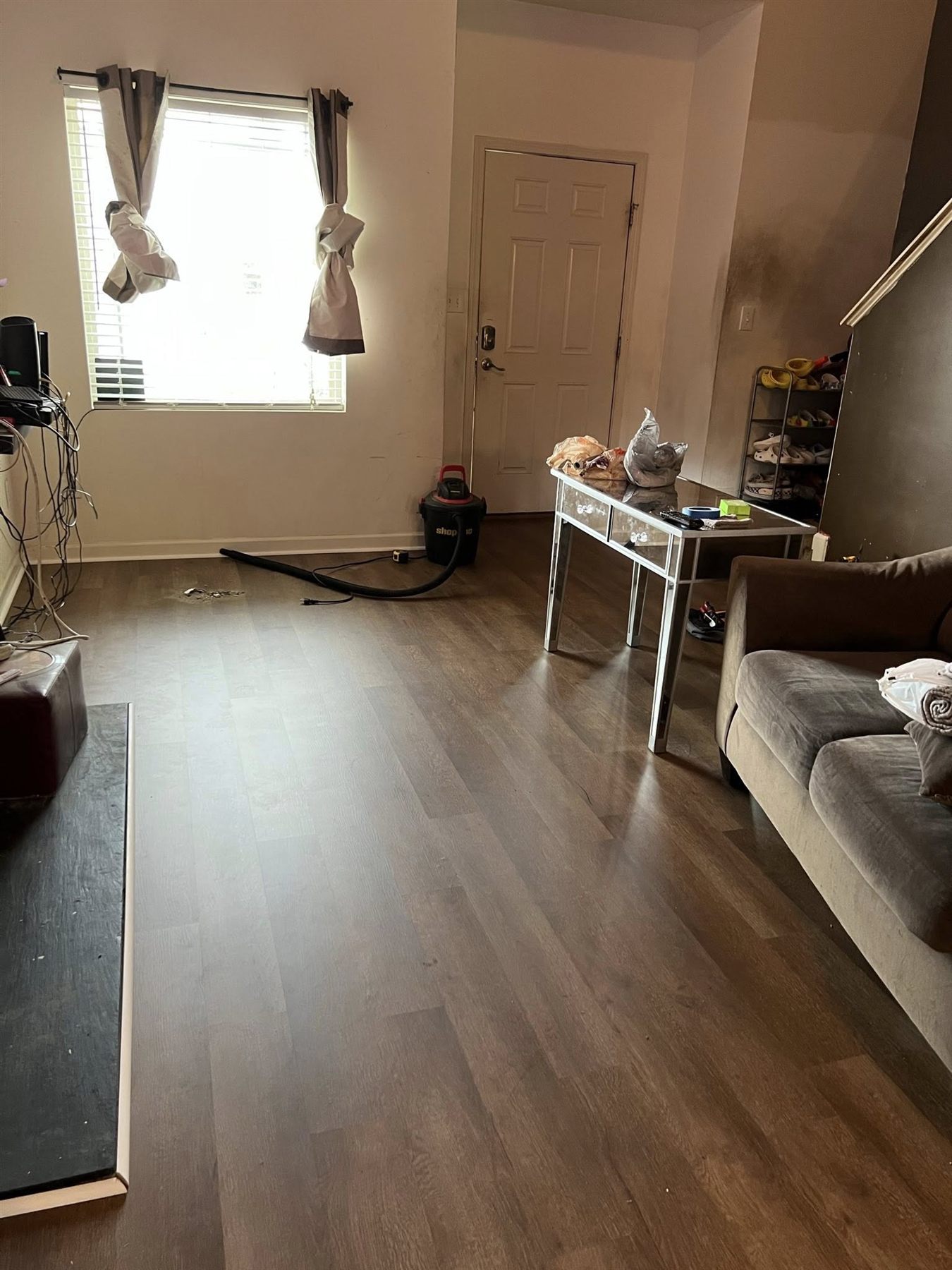 Living room with new luxury vinyl plank flooring throughout